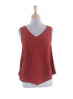 SLEEVELESS SOLID BLOUSE